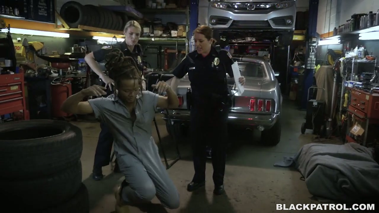 Two white police whores ride a big black cock in a chop shop