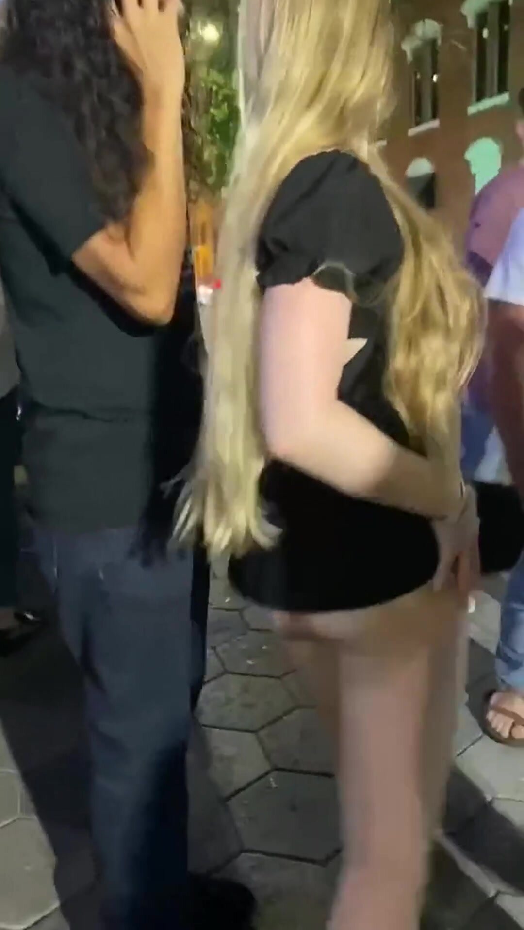 Flashing ass in the middle of the crowd