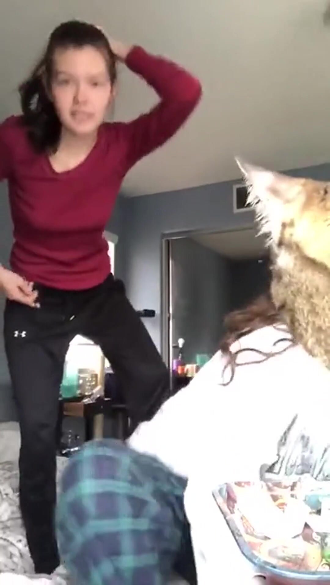 Pantsing her hairy friend