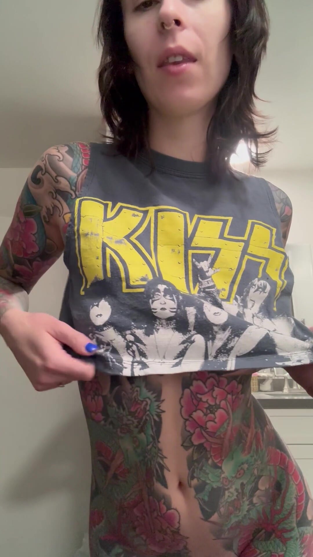 Suckable tattoo titty show