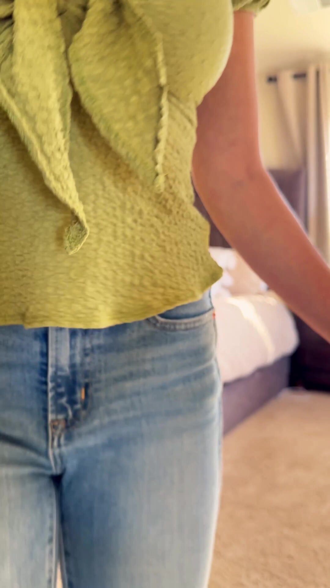 Green top, blue jeans, zero panties.