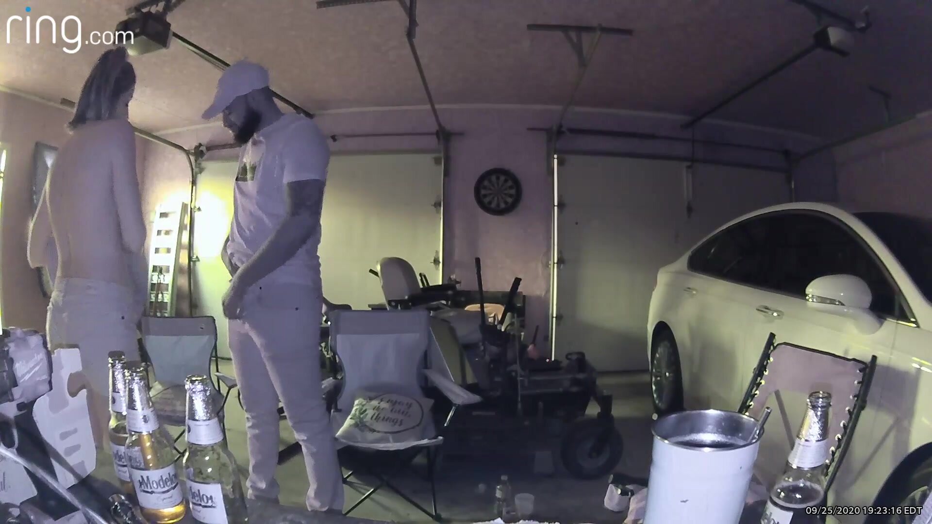 Taking the delivery driver to the garage to have some fun while the family eats pizza.