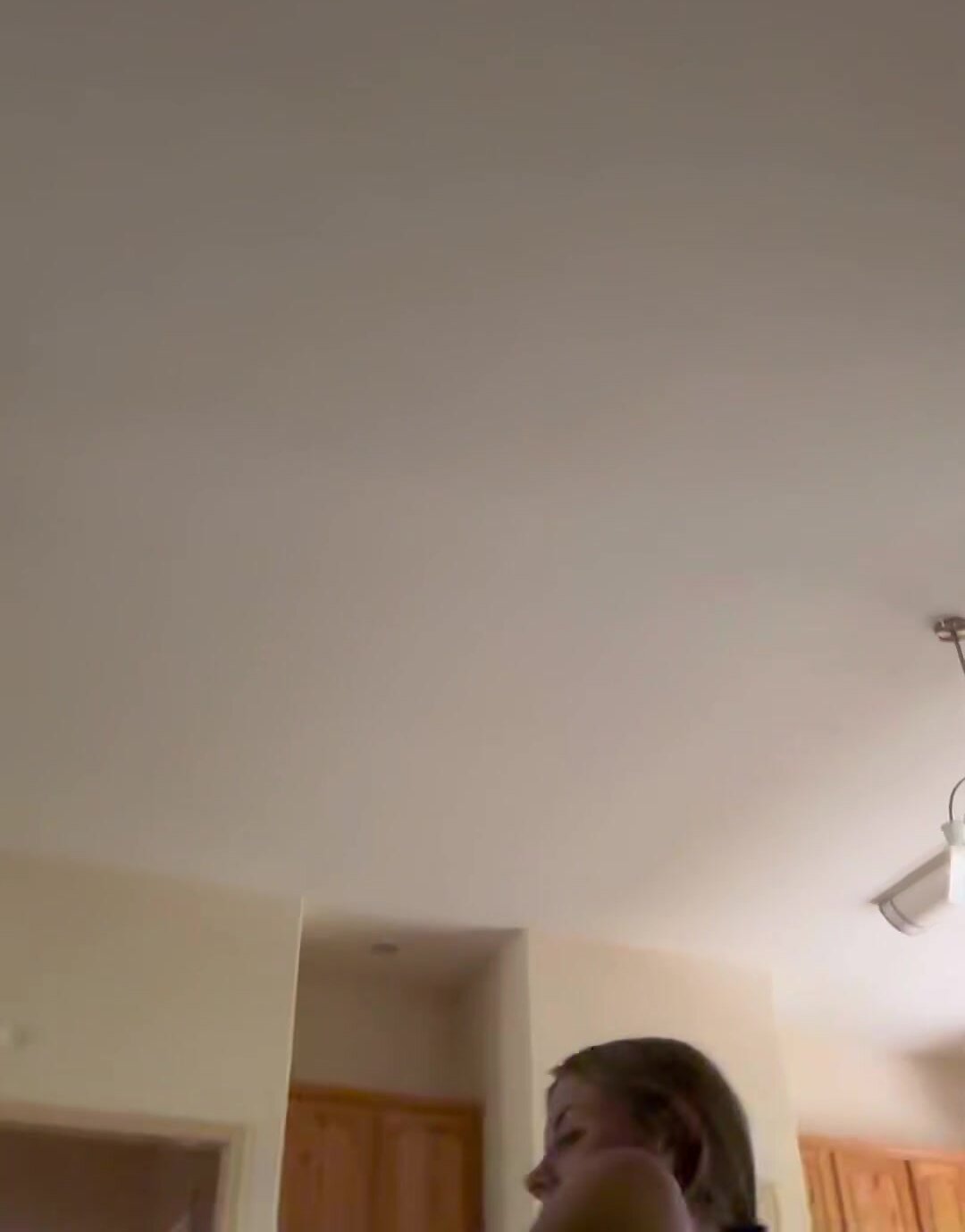 Pleasuring his big cock on the couch in my red tank top