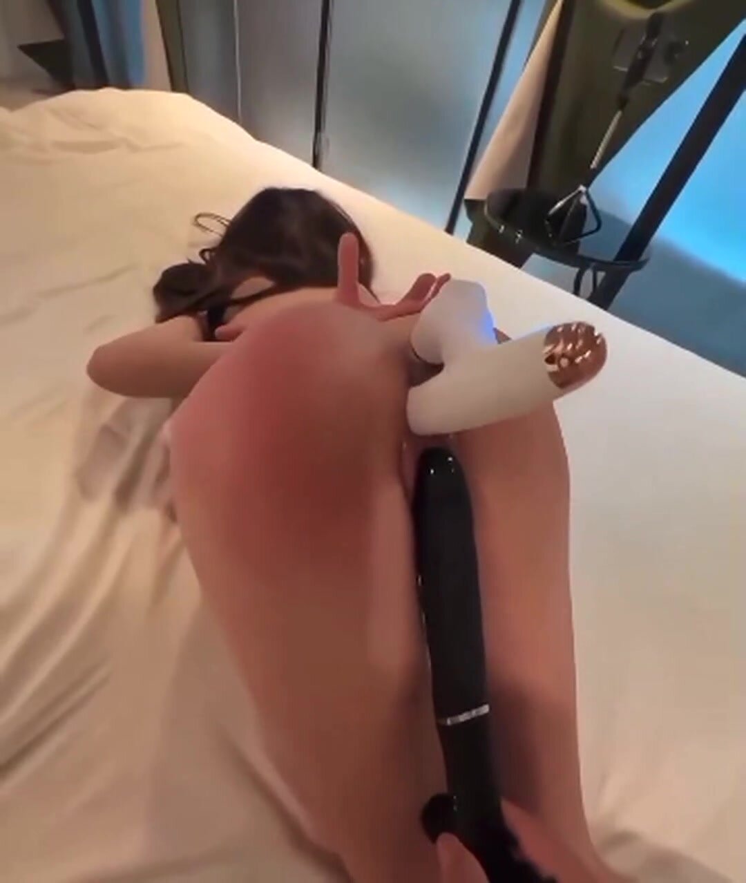 Face down, ass up, restrained toy play.