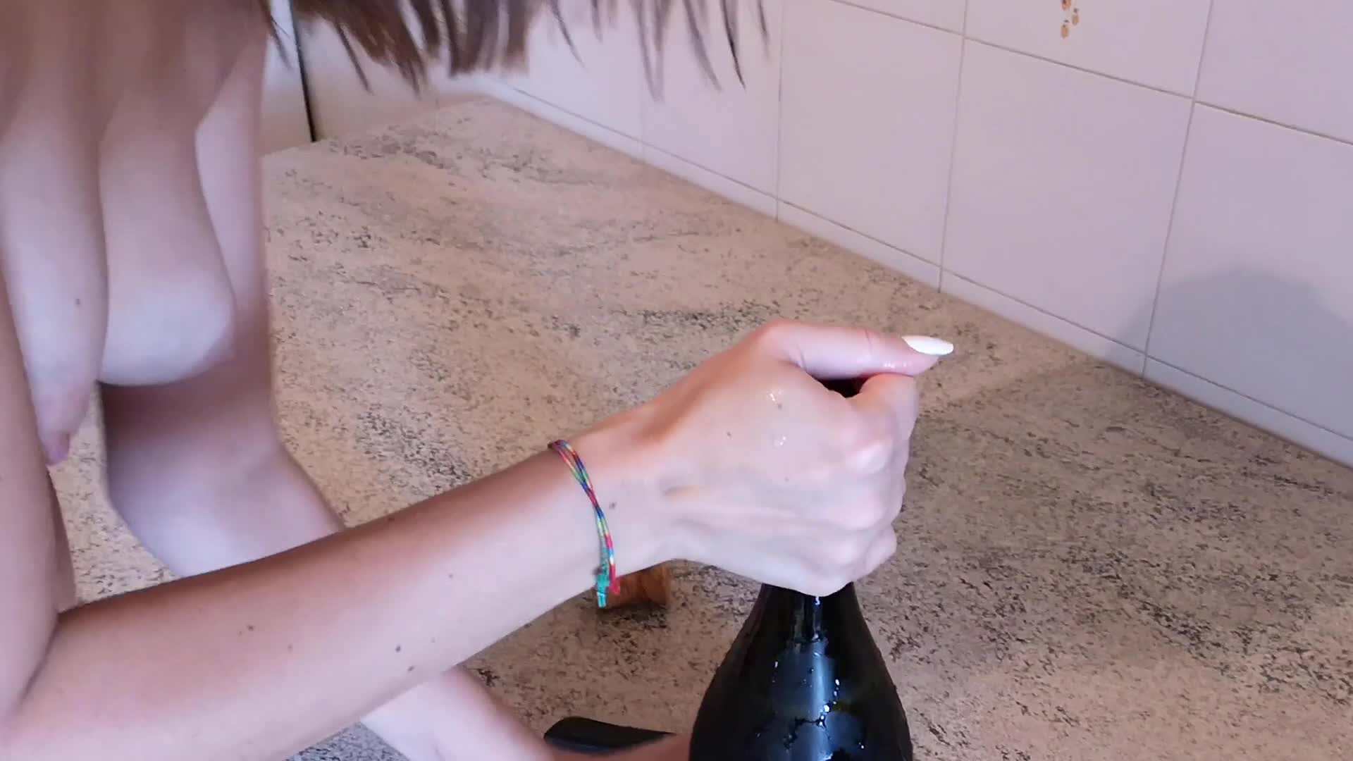 Draining champagne bottle