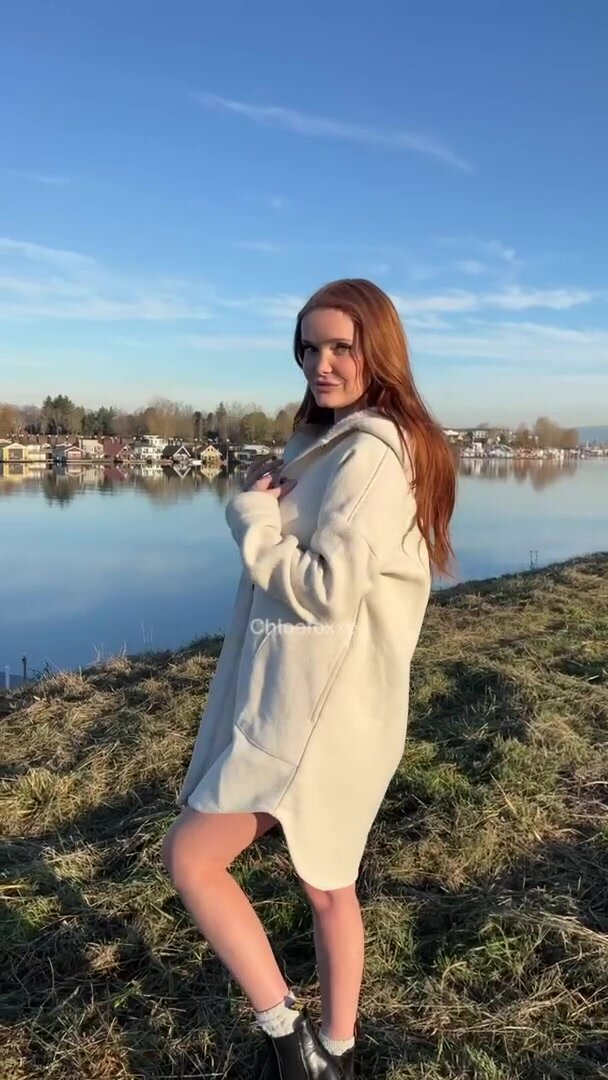 Showing off my natural tits river side ;)