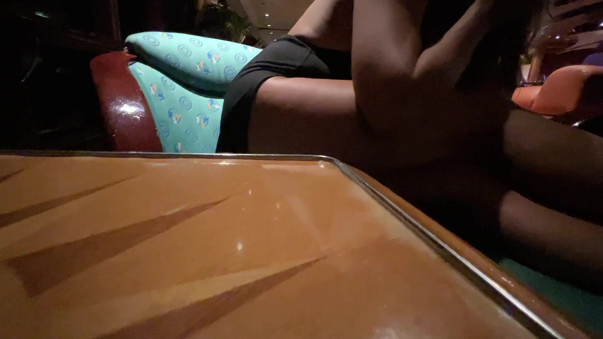 Putting my plug in while sitting inside the piano bar!